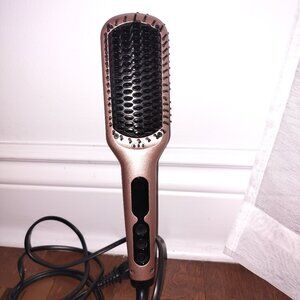 Hair straightening comb (hot comb)